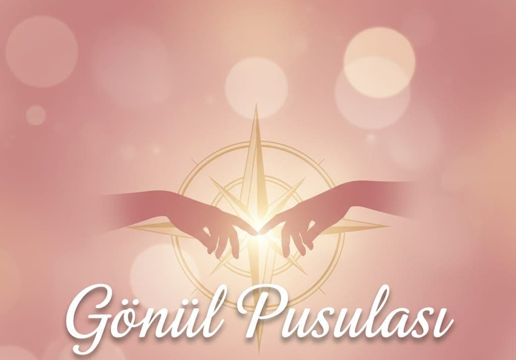 Gönül Pusulası: altın bir pusulanın önünde birbirine uzanan iki el